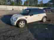 2006 MINI Hardtop with VIN WMWRC33536TK66138, listed as a Copart auction lot 81620335 with 128,877 mi miles and Salvage title. Bid and sale history available at DreamBid. Image 1.