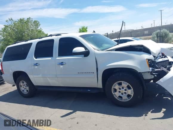 2007 Chevrolet Suburban LTZ with VIN 1GNFK163X7J305481, listed as a IAAI auction lot 42402983 with 147,778 mi miles and . Bid and sale history available at DreamBid. Image 13.
