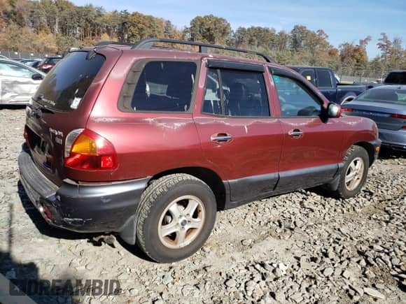 2003 Hyundai Santa Fe GLS z VIN KM8SC13E93U493697, wystawiony jako Copart lot #78350284 z przebiegiem 82 871 mil mil oraz Szkoda całkowita • Salvage title. Historia ofert i sprzedaży dostępna na DreamBid. Obrazek 3.