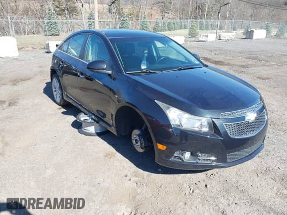 2012 Chevrolet Cruze LTZ с VIN 1G1PH5SC5C7296231, выставлен на аукционе IAAI как лот 41811729 с пробегом 89 790 миль миль и . История ставок и продаж доступна на DreamBid. Изображение 1.