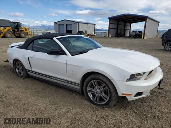2012 Ford Mustang V6 с VIN 1ZVBP8EM5C5252412, выставлен на аукционе Copart как лот 49006125 с пробегом 124 231 миль миль и Списание • Salvage title. История ставок и продаж доступна на DreamBid. Изображение 4.