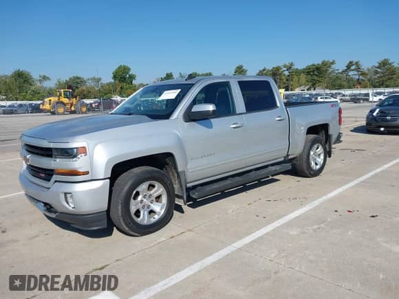 2018 Chevrolet Silverado 1500 LT with VIN 3GCUKREC4JG339988, listed as a IAAI auction lot 43222960 with 162,440 mi miles and . Bid and sale history available at DreamBid. Image 17.