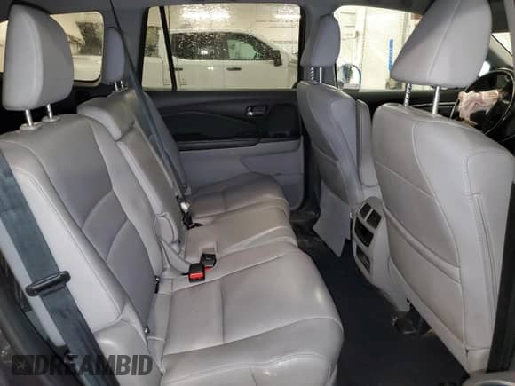 2018 Honda Pilot EX-L z VIN 5FNYF6H61JB038434, wystawiony jako Copart lot #69637125 z przebiegiem 104 786 mil mil oraz Szkoda całkowita • Salvage title. Historia ofert i sprzedaży dostępna na DreamBid. Obrazek 11.