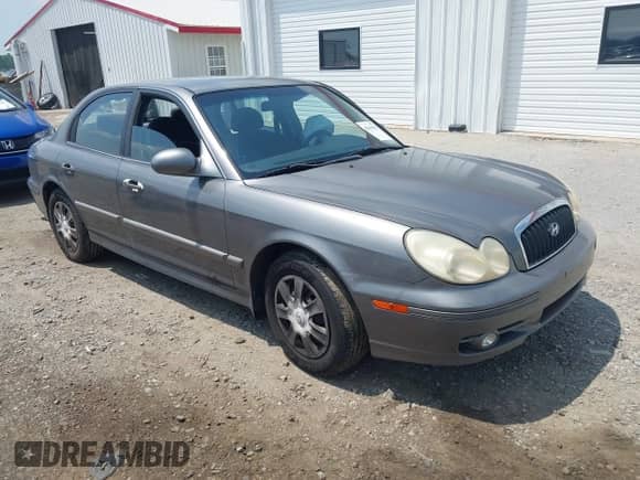 2004 Hyundai Sonata z VIN KMHWF25SX4A033243, wystawiony jako IAAI lot #42610903 z przebiegiem 162 967 mil mil oraz . Historia ofert i sprzedaży dostępna na DreamBid. Obrazek 1.