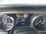 2023 Jeep Wrangler Sport S with VIN 1C4HJXDG7PW695651, listed as a IAAI auction lot 42585722 with 25,802 mi miles and . Bid and sale history available at DreamBid. Image 16.