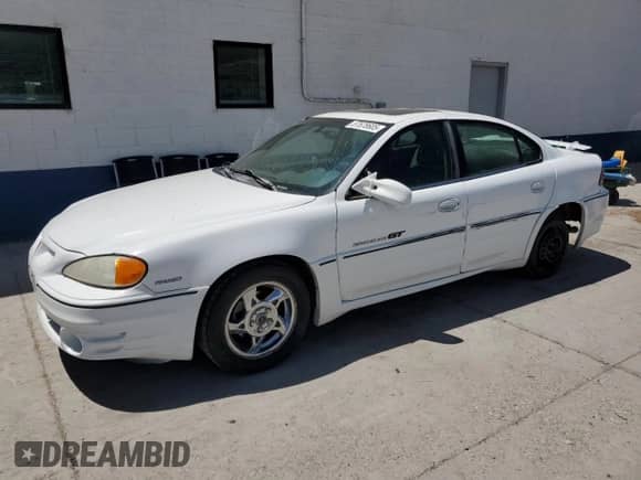 2002 Pontiac Grand Am GT z VIN 1G2NW52E42M549744, wystawiony jako Copart lot #57678605 z przebiegiem 220 067 mil mil oraz Szkoda całkowita • Salvage title. Historia ofert i sprzedaży dostępna na DreamBid. Obrazek 1.
