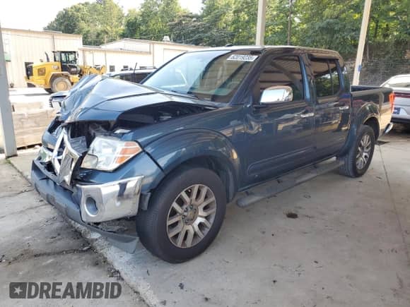 2013 Nissan Frontier SL with VIN 1N6AD0ER2DN712919, listed as a Copart auction lot 62019235 with 242,539 mi miles and Salvage title. Bid and sale history available at DreamBid. Image 1.