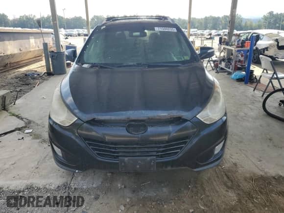 2013 Hyundai Tucson GLS z VIN KM8JUCACXDU692474, wystawiony jako Copart lot #71500255 z przebiegiem 318 361 mil mil oraz Czysty tytuł • Clean title. Historia ofert i sprzedaży dostępna na DreamBid. Obrazek 5.