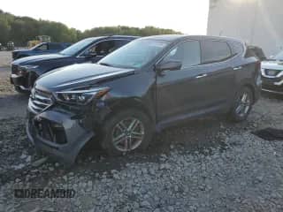 2018 Hyundai Santa Fe 2.4L с VIN 5XYZTDLBXJG546447, выставлен на аукционе Copart как лот 65197905 с пробегом 75 551 миль миль и Списание • Salvage title. История ставок и продаж доступна на DreamBid. Изображение 1.
