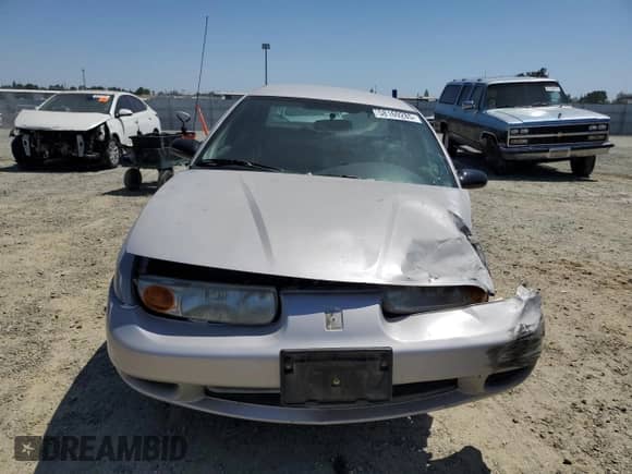2000 Saturn SL with VIN 1G8ZH5280YZ121421, listed as a Copart auction lot 58169285 with 226,014 mi miles and Salvage title. Bid and sale history available at DreamBid. Image 5.
