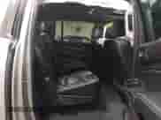 2019 Chevrolet Suburban LT with VIN 1GNSKHKC4KR289284, listed as a IAAI auction lot 41366478 with 175,690 mi miles and . Bid and sale history available at DreamBid. Image 8.