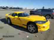 2002 Dodge Viper GTS с VIN 1B3ER69E72V102108, выставлен на аукционе Copart как лот 80082204 с пробегом 118 759 миль миль и Списание • Salvage title. История ставок и продаж доступна на DreamBid. Изображение 4.