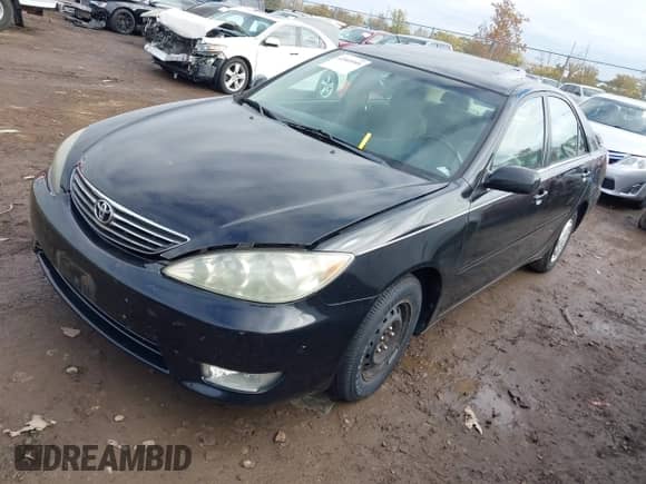2005 Toyota Camry LE with VIN 4T1BE32K75U033180, listed as a IAAI auction lot 43569595 with 122,045 mi miles and . Bid and sale history available at DreamBid. Image 2.