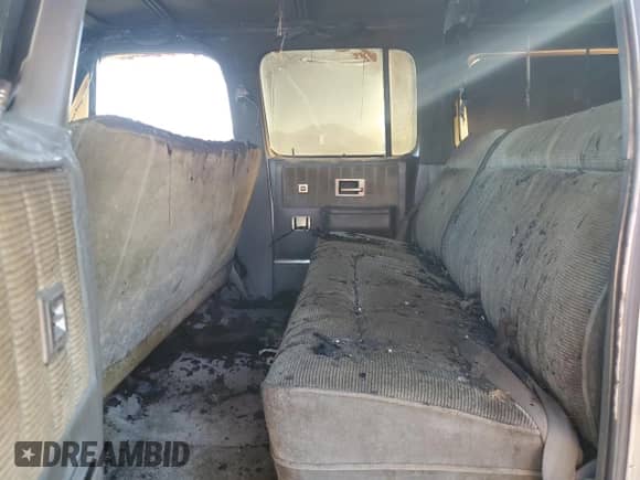 1989 Chevrolet Suburban with VIN 1GNGV26K8KF128711, listed as a Copart auction lot 46658895 with Not provided miles and Salvage title. Bid and sale history available at DreamBid. Image 12.