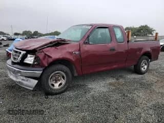 2003 Ford F-150 XL with VIN 1FTRX17283NA09956, listed as a Copart auction lot 81526395 with 195,707 mi miles and Salvage title. Bid and sale history available at DreamBid. Image 1.