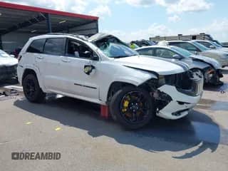 2014 Jeep Grand Cherokee SRT-8 с VIN 1C4RJFDJ3EC451648, выставлен на аукционе IAAI как лот 42968131 с пробегом 121 948 миль миль и . История ставок и продаж доступна на DreamBid. Изображение 1.