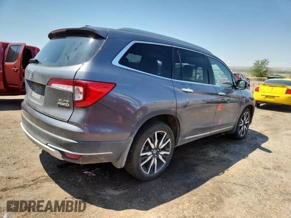 2020 Honda Pilot Elite z VIN 5FNYF6H02LB032625, wystawiony jako Copart lot #69782685 z przebiegiem 68 084 mil mil oraz Czysty tytuł • Clean title. Historia ofert i sprzedaży dostępna na DreamBid. Obrazek 3.