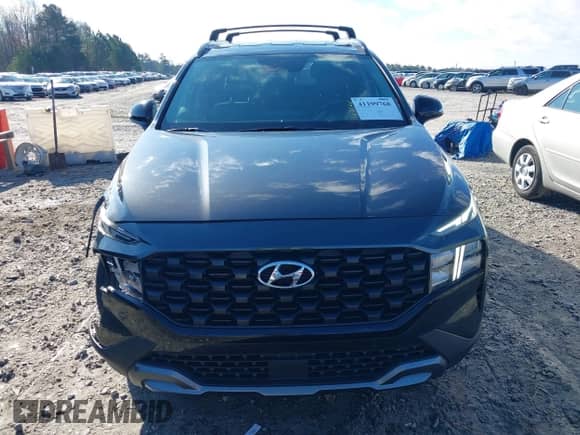 2022 Hyundai Santa Fe XRT with VIN 5NMS64AJ6NH396903, listed as a IAAI auction lot 41199768 with 60,874 mi miles and . Bid and sale history available at DreamBid. Image 12.