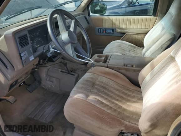 1994 GMC Sierra 1500 with VIN 2GTEK19K1R1548357, listed as a Copart auction lot 82556885 with 157,548 mi miles and Clean title. Bid and sale history available at DreamBid. Image 7.