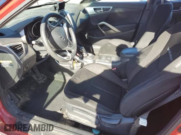 2013 Hyundai Veloster w/Black Int z VIN KMHTC6AD2DU126699, wystawiony jako Copart lot #57329805 z przebiegiem 85 303 mil mil oraz Szkoda całkowita • Salvage title. Historia ofert i sprzedaży dostępna na DreamBid. Obrazek 7.