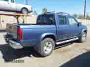 2000 Nissan Frontier XE with VIN 1N6ED27TXYC378601, listed as a IAAI auction lot 42690648 with 216,829 mi miles and . Bid and sale history available at DreamBid. Image 4.