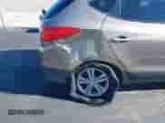 2013 Hyundai Tucson GLS with VIN KM8JU3AC0DU687400, listed as a IAAI auction lot 43191184 with 130,345 mi miles and . Bid and sale history available at DreamBid. Image 6.