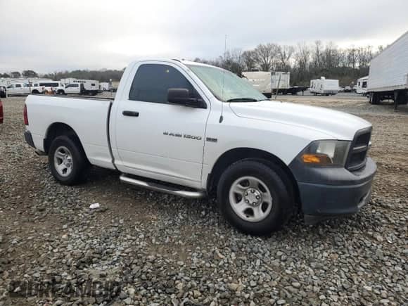 2012 Ram 1500 Tradesman с VIN 3C6JD6AT1CG126895, выставлен на аукционе Copart как лот 42921325 с пробегом 193 878 миль миль и Списание • Salvage title. История ставок и продаж доступна на DreamBid. Изображение 4.