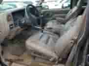 1997 Chevrolet Suburban with VIN 3GNFK16R5VG178674, listed as a Copart auction lot 80760694 with 248,492 mi miles and Salvage title. Bid and sale history available at DreamBid. Image 7.