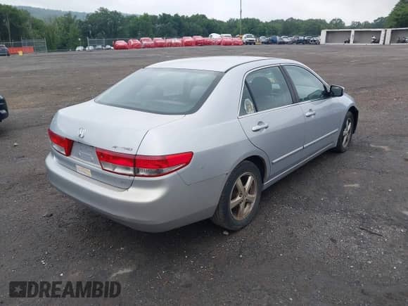 2004 Honda Accord EX with VIN 1HGCM566X4A135367, listed as a IAAI auction lot 42736135 with 239,194 mi miles and . Bid and sale history available at DreamBid. Image 4.