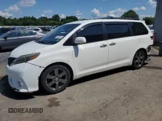 2016 Toyota Sienna SE with VIN 5TDXK3DCXGS752276, listed as a Copart auction lot 65360255 with 245,006 mi miles and Salvage title. Bid and sale history available at DreamBid. Image 1.
