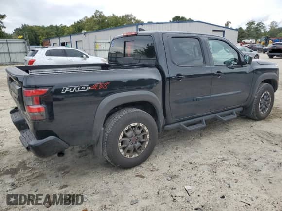 2025 Nissan Frontier Pro-4X with VIN 1N6ED1EK7SN612127, listed as a Copart auction lot 80576445 with 11,489 mi miles and Salvage title. Bid and sale history available at DreamBid. Image 3.