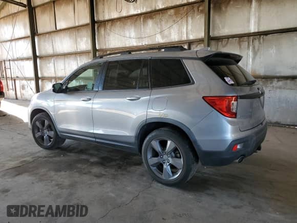 2019 Honda Passport Touring with VIN 5FNYF7H91KB008724, listed as a Copart auction lot 80562725 with 71,737 mi miles and Salvage title. Bid and sale history available at DreamBid. Image 2.
