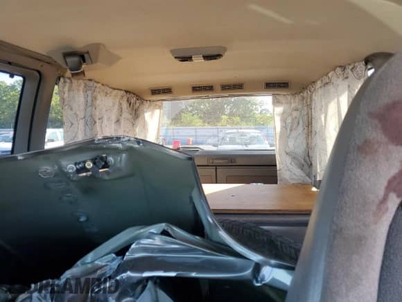 2002 Chevrolet Astro z VIN 1GNEL19X22B109349, wystawiony jako Copart lot #71454905 z przebiegiem 144 417 mil mil oraz Szkoda całkowita • Salvage title. Historia ofert i sprzedaży dostępna na DreamBid. Obrazek 10.