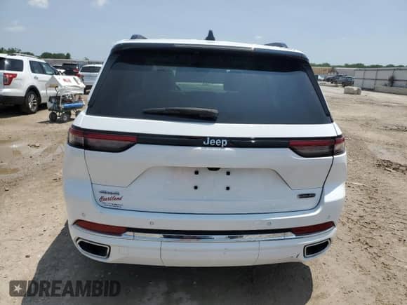 2023 Jeep Grand Cherokee Overland z VIN 1C4RJHDG2PC579835, wystawiony jako Copart lot #57236365 z przebiegiem 7 153 mil mil oraz Szkoda całkowita • Salvage title. Historia ofert i sprzedaży dostępna na DreamBid. Obrazek 6.