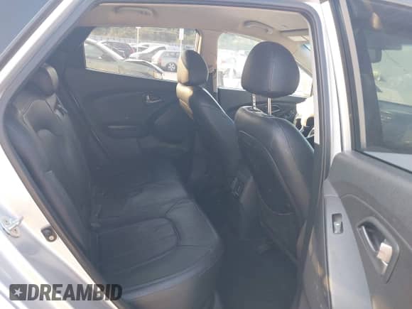 2014 Hyundai Tucson SE with VIN KM8JU3AG3EU901414, listed as a IAAI auction lot 43267845 with 141,471 mi miles and . Bid and sale history available at DreamBid. Image 8.