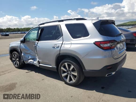 2024 Honda Pilot Touring with VIN 5FNYG1H74RB016366, listed as a Copart auction lot 64484215 with 24,788 mi miles and Salvage title. Bid and sale history available at DreamBid. Image 2.