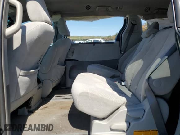 2012 Toyota Sienna LE AAS with VIN 5TDKK3DCXCS230395, listed as a Copart auction lot 80191145 with 169,378 mi miles and Salvage title. Bid and sale history available at DreamBid. Image 11.