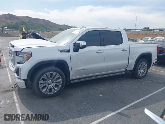 2021 GMC Sierra 1500 Denali with VIN 3GTU9FEL1MG349215, listed as a IAAI auction lot 42268438 with 97,465 mi miles and . Bid and sale history available at DreamBid. Image 14.