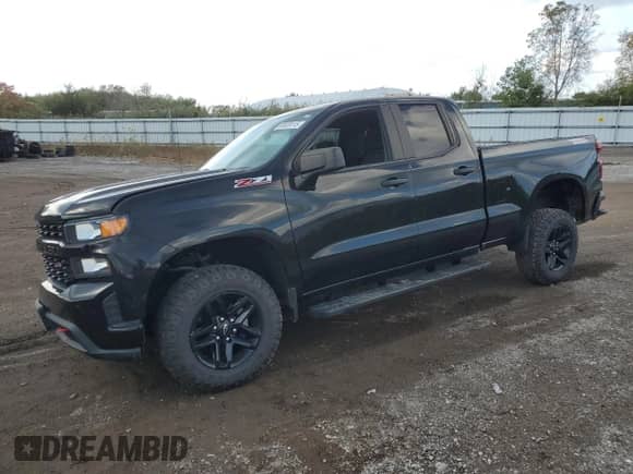 2019 Chevrolet Silverado 1500 Custom Trail Boss with VIN 1GCRYCEF8KZ402961, listed as a Copart auction lot 83939115 with 87,615 mi miles and Salvage title. Bid and sale history available at DreamBid. Image 1.
