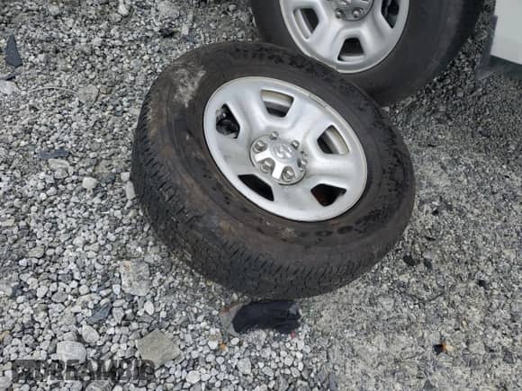 2024 Ram 1500 Tradesman with VIN 1C6RREGG7RN210034, listed as a Copart auction lot 59610625 with 14,443 mi miles and Salvage title. Bid and sale history available at DreamBid. Image 12.