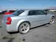 2009 Chrysler 300 Touring с VIN 2C3KA53V59H632158, выставлен на аукционе Copart как лот 65571265 с пробегом 256 000 миль миль и Списание • Salvage title. История ставок и продаж доступна на DreamBid. Изображение 3.