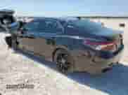 2021 Toyota Camry XSE with VIN 4T1K61AK9MU402834, listed as a Copart auction lot 71657335 with 77,028 mi miles and Salvage title. Bid and sale history available at DreamBid. Image 2.