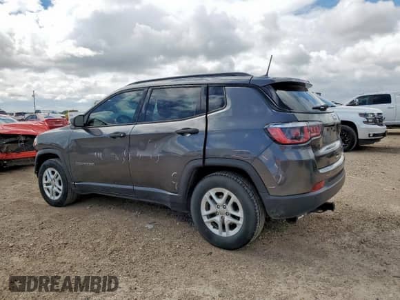 2017 Jeep Compass Sport with VIN 3C4NJCABXHT643443, listed as a Copart auction lot 83998585 with 93,790 mi miles and Clean title. Bid and sale history available at DreamBid. Image 2.