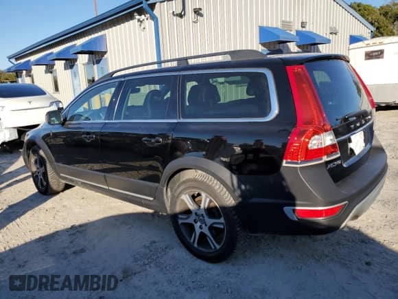 2015 Volvo XC70 T6 Platinum z VIN YV4902NM9F1206464, wystawiony jako Copart lot #87279814 z przebiegiem 170 814 mil mil oraz Szkoda całkowita • Salvage title. Historia ofert i sprzedaży dostępna na DreamBid. Obrazek 2.