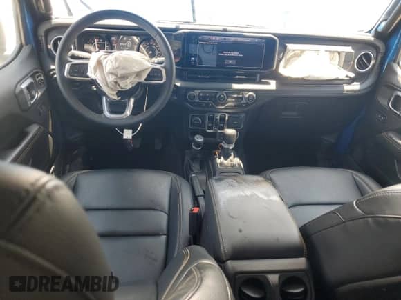 2024 Jeep Wrangler Sahara с VIN 1C4PJXEN9RW113061, выставлен на аукционе Copart как лот 66618365 с пробегом 18 911 миль миль и Списание • Salvage title. История ставок и продаж доступна на DreamBid. Изображение 8.