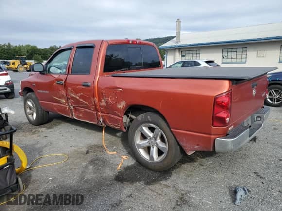 2007 Dodge 1500 SLT with VIN 1D7HU18287S268513, listed as a Copart auction lot 80183575 with 110,656 mi miles and Salvage title. Bid and sale history available at DreamBid. Image 2.