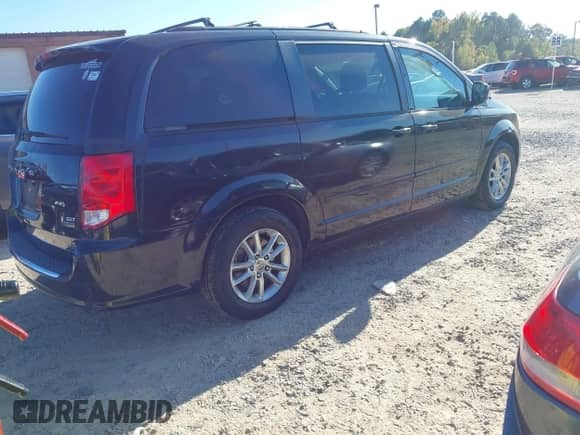 2014 Dodge Grand Caravan SXT with VIN 2C4RDGCG5ER122475, listed as a IAAI auction lot 43423105 with 189,985 mi miles and . Bid and sale history available at DreamBid. Image 4.