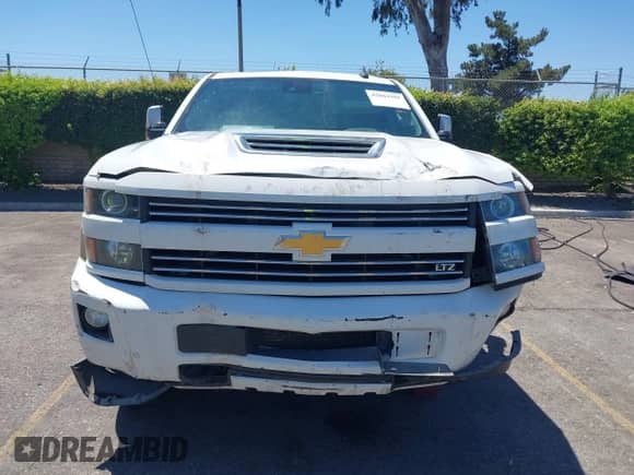 2018 Chevrolet Silverado 2500HD LTZ с VIN 1GC1KWEY7JF154848, выставлен на аукционе IAAI как лот 42864395 с пробегом 201 028 миль миль и . История ставок и продаж доступна на DreamBid. Изображение 13.