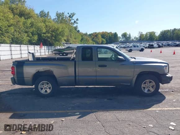 2008 Dodge Dakota SLT with VIN 1D7HW42K08S520440, listed as a IAAI auction lot 43351923 with 211,310 mi miles and . Bid and sale history available at DreamBid. Image 14.