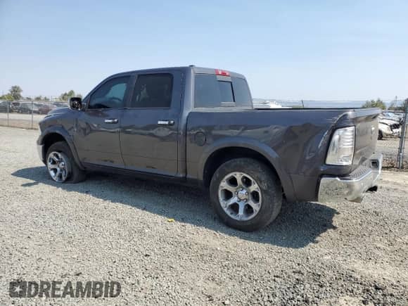 2017 Ram 1500 Laramie с VIN 1C6RR7NT1HS854673, выставлен на аукционе Copart как лот 71326135 с пробегом 65 403 миль миль и Списание • Salvage title. История ставок и продаж доступна на DreamBid. Изображение 2.